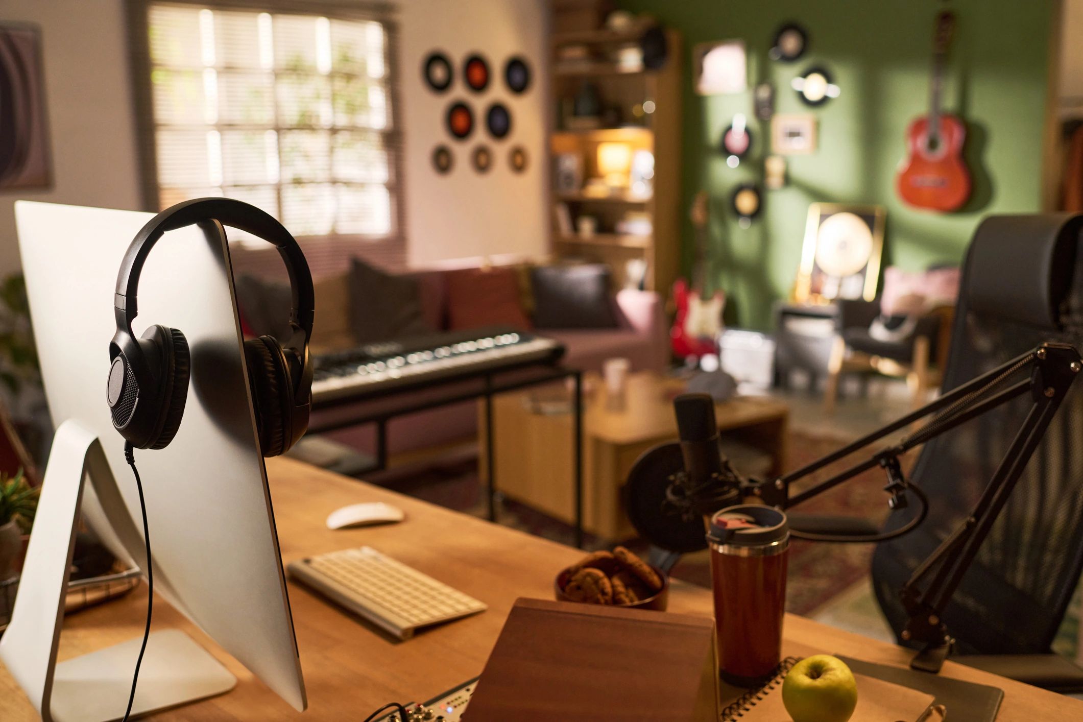 Podcast studio workspace with microphone and recording equipment